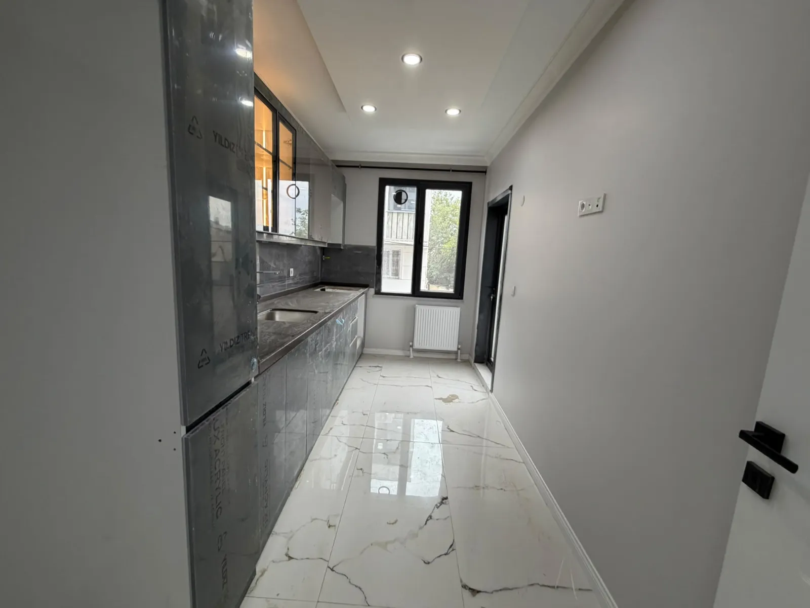 KARLIBAYIR MAHALLESİNDE SATILIK YÜKSEK GİRİŞ 2+1 DAİRE görsel 9